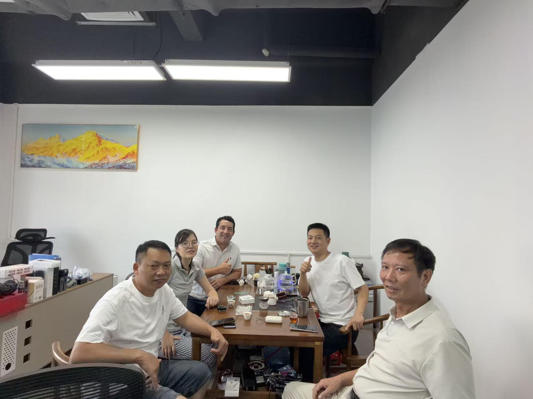 Rey with participants at a supplier meeting